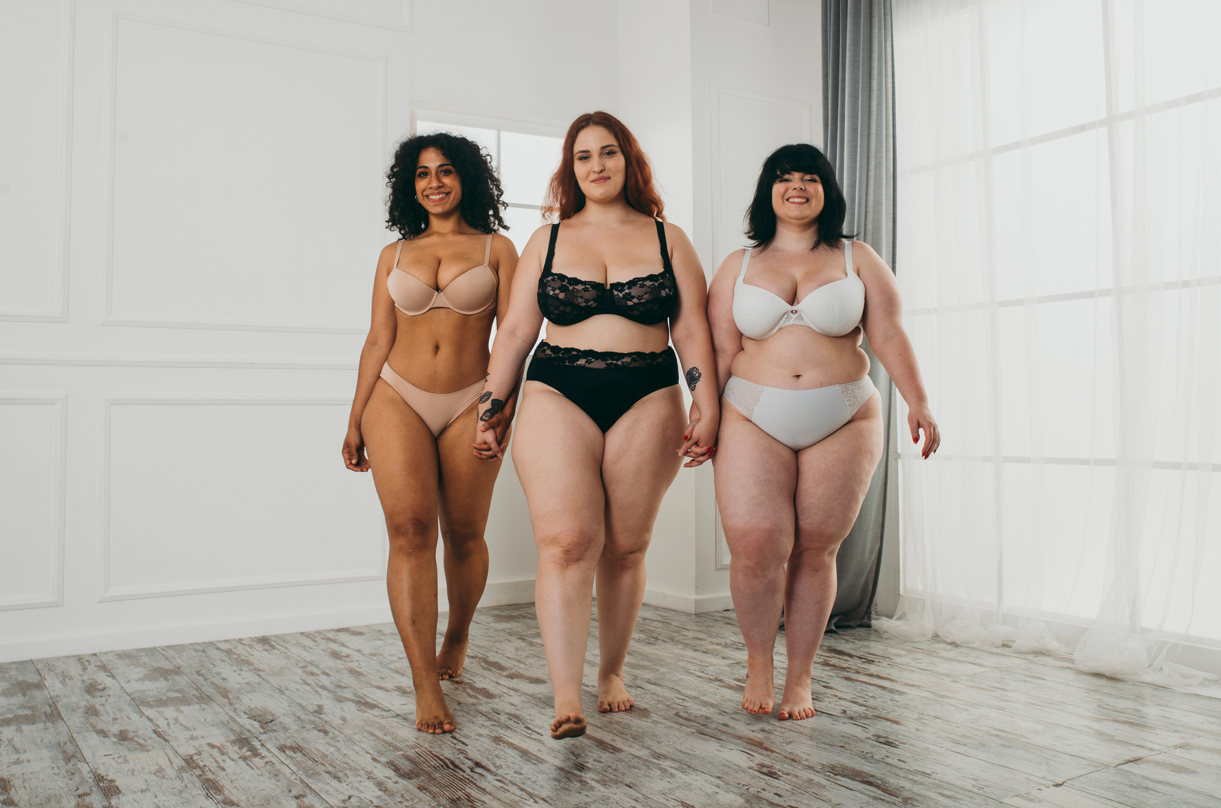 Body Acceptance Concept. Group of Curvy Girl Posing in Studio Ag